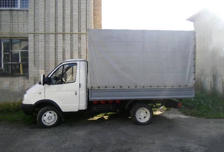 Заказать грузовой автомобиль для отправки личныx вещей : Холодильник из Киселевска в Новосибирск