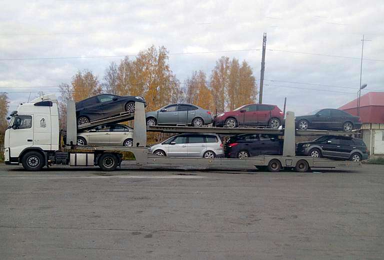 Перевозка автомобиля на эвакуаторе из Кемерово в Новосибирск